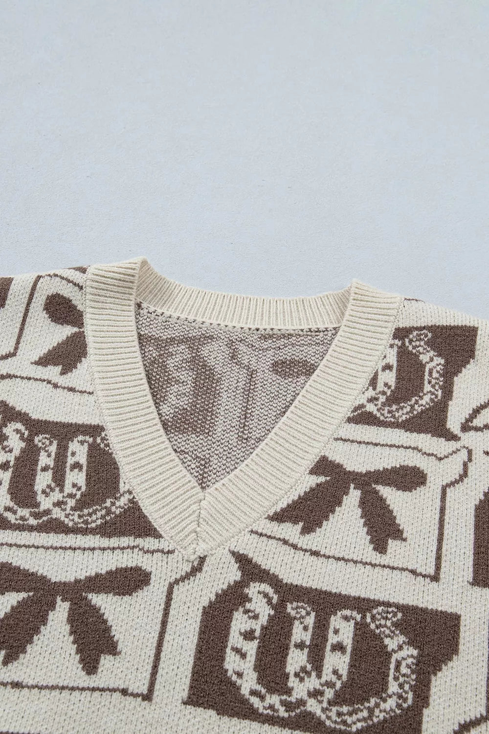 Trendsi Western Horseshoe Bow Pattern Button Front Sleeveless Knit Sweater -