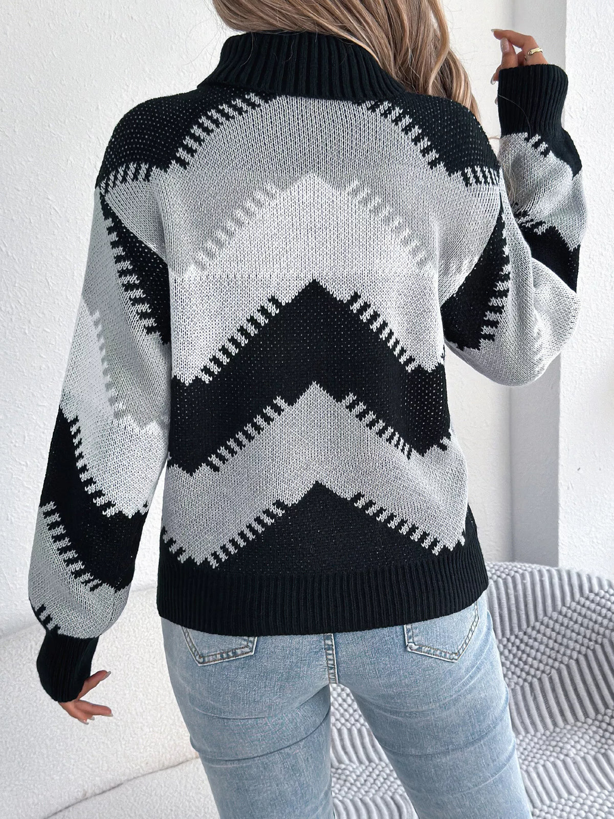 Black chevron pattern turtleneck sweater, back view