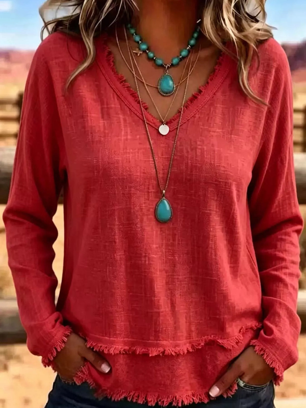 Frayed-hem blouse, red front on model