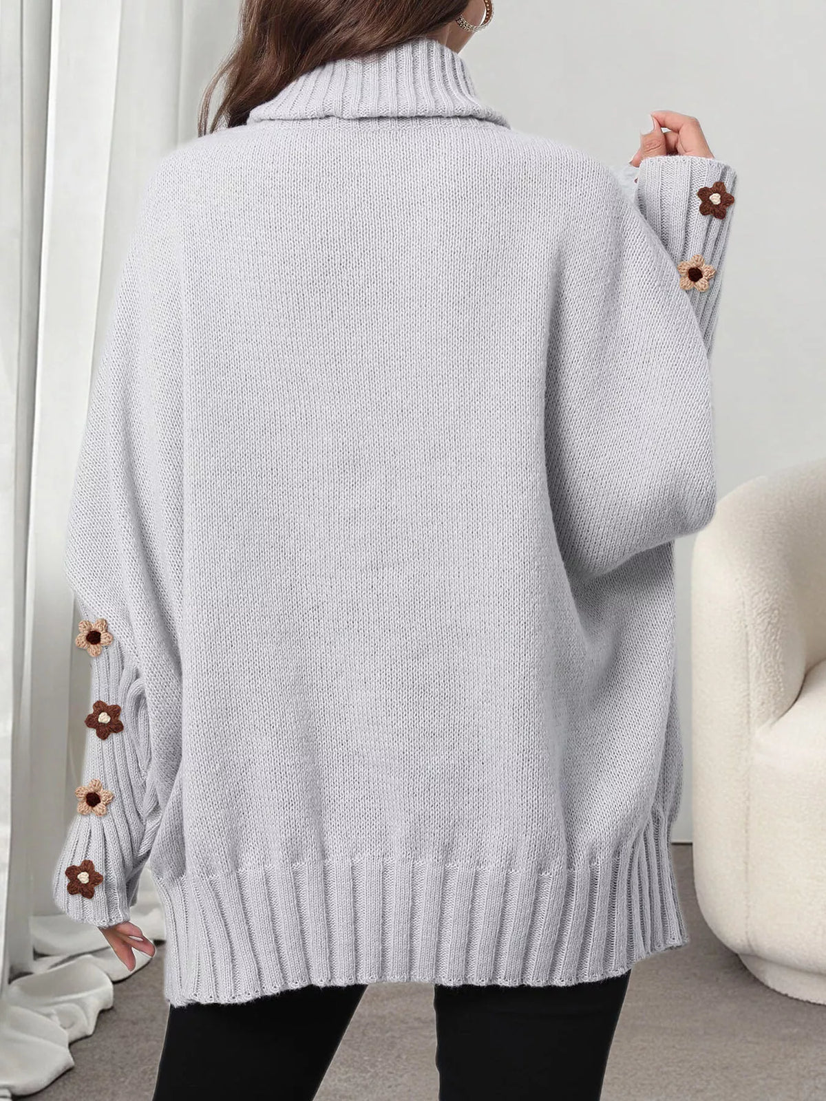 Gray oversized floral sleeve turtleneck sweater, back view
