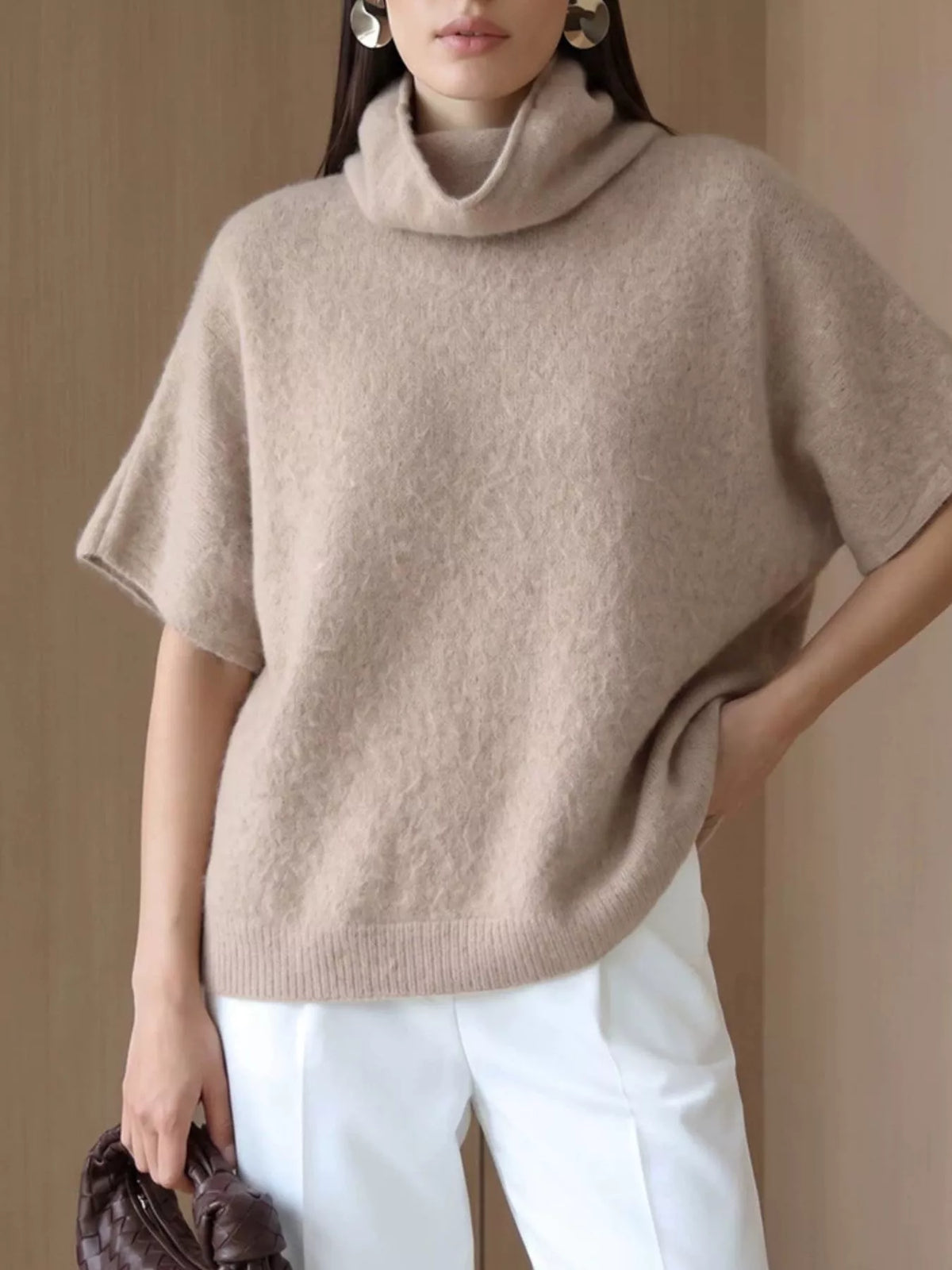 Fuzzy short-sleeve turtleneck sweater in tan, angled full front view