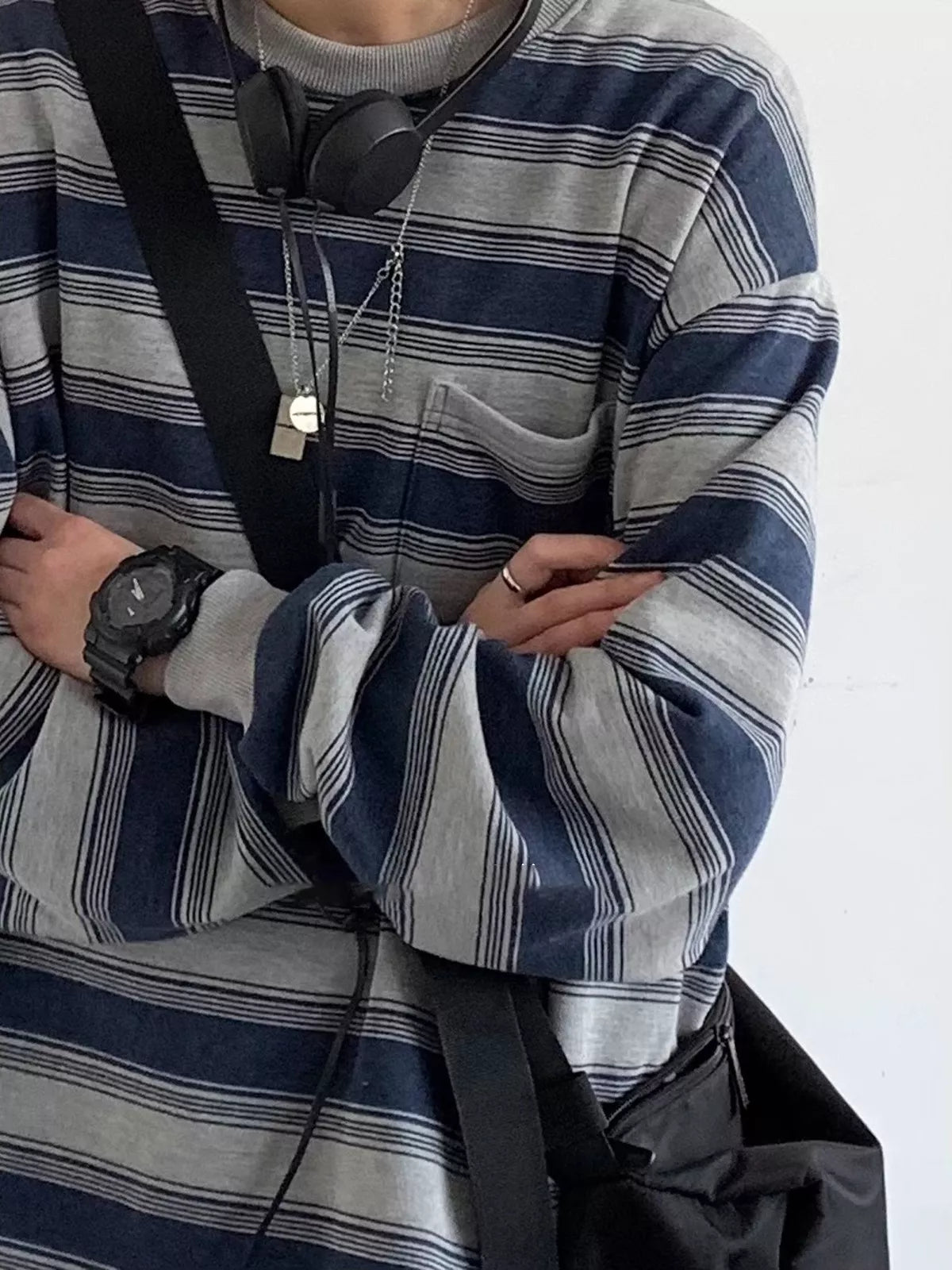 Women's Oversized Striped Crewneck Sweatshirt with Chest Pocket in blue and gray — pocket detail view