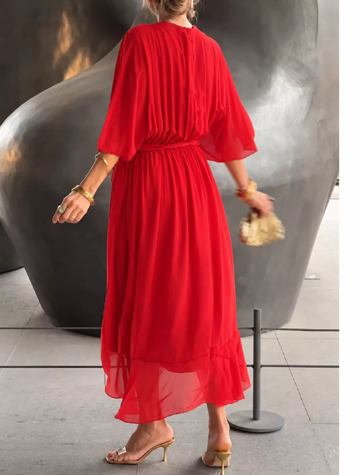 Red batwing sleeve wrap dress with waist tie, back view