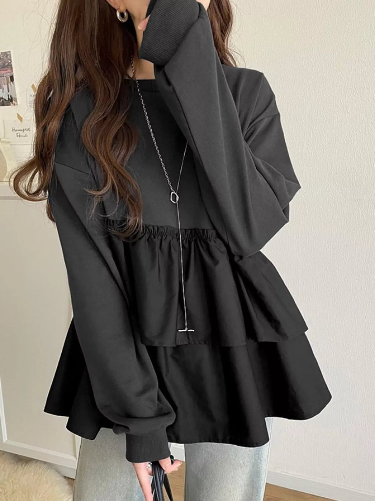 Black color-block ruffled hem top