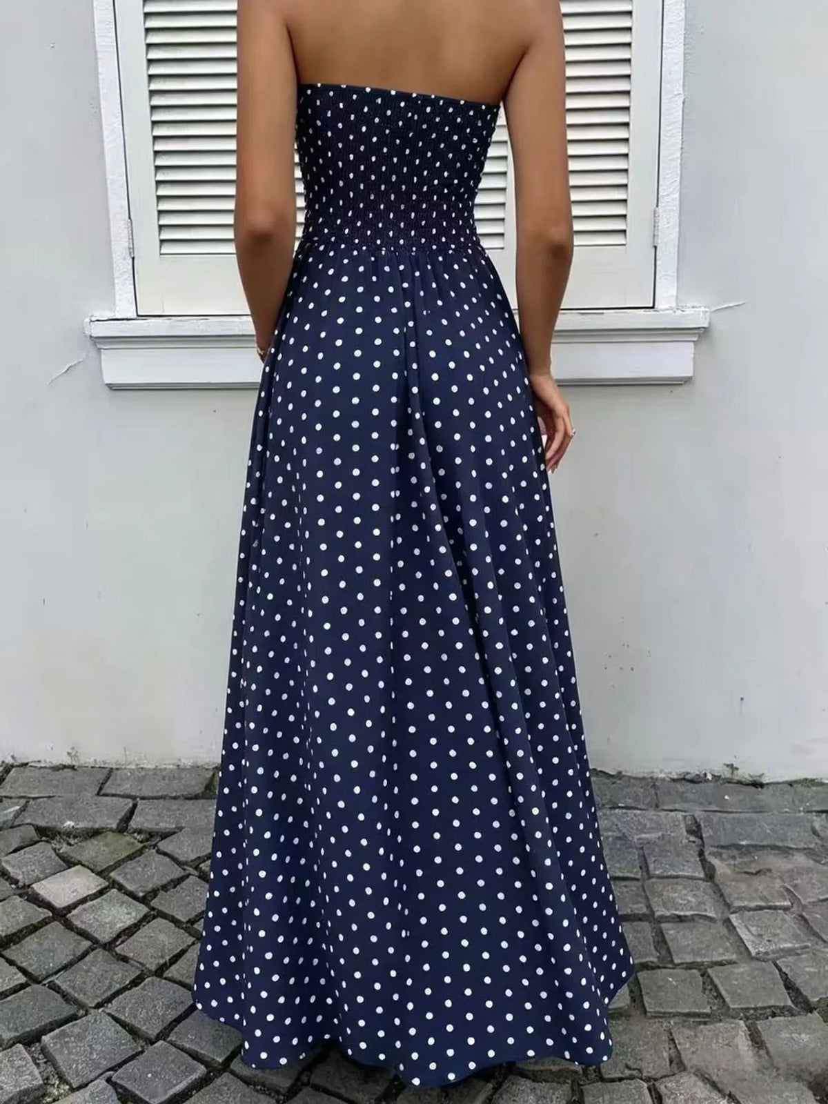 Women's Strapless Polka Dot Ruched Maxi Dress in navy dots — back view