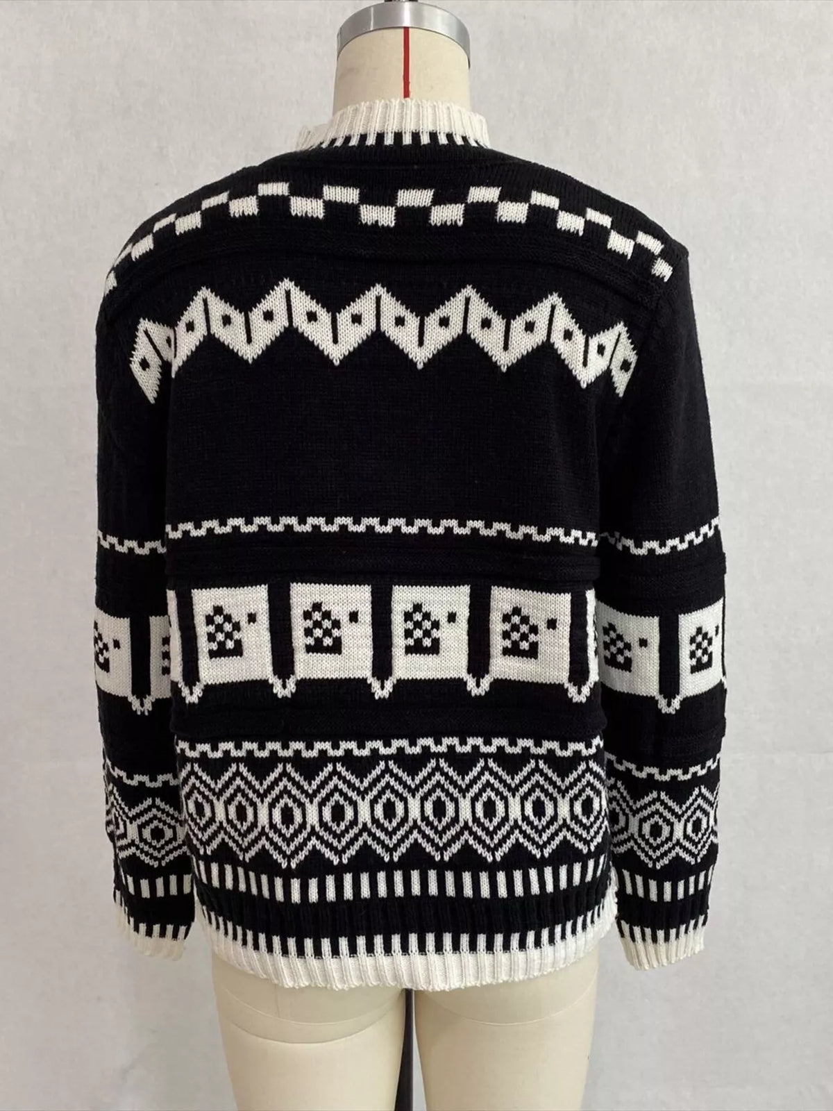 Black and white christmas fair isle crewneck sweater, back on dress form.