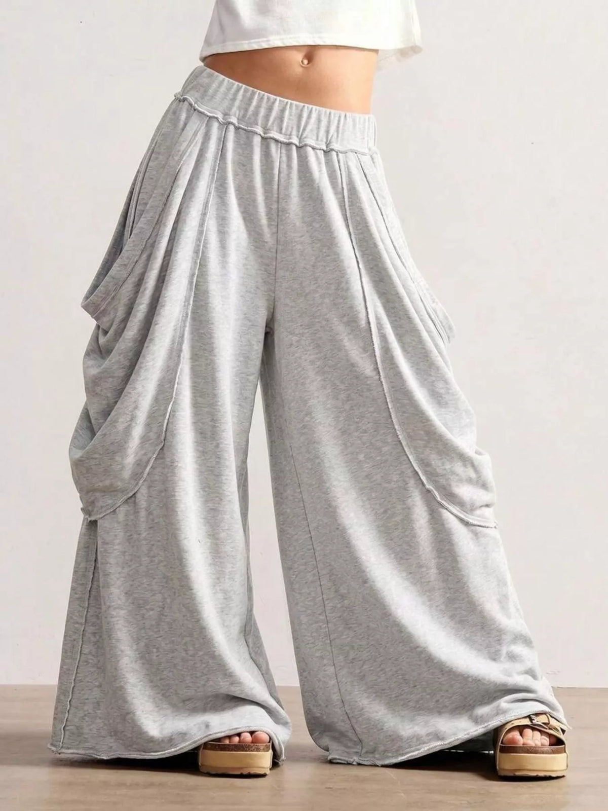 Light gray wide-leg cargo pants, front view