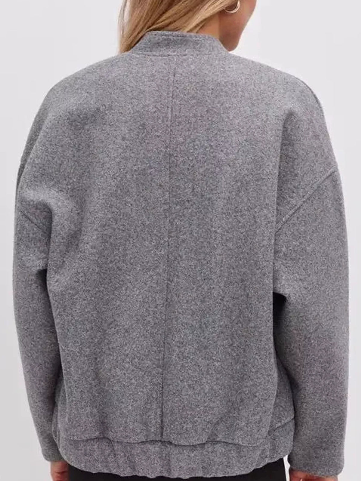 Gray snap-button bomber jacket, back view