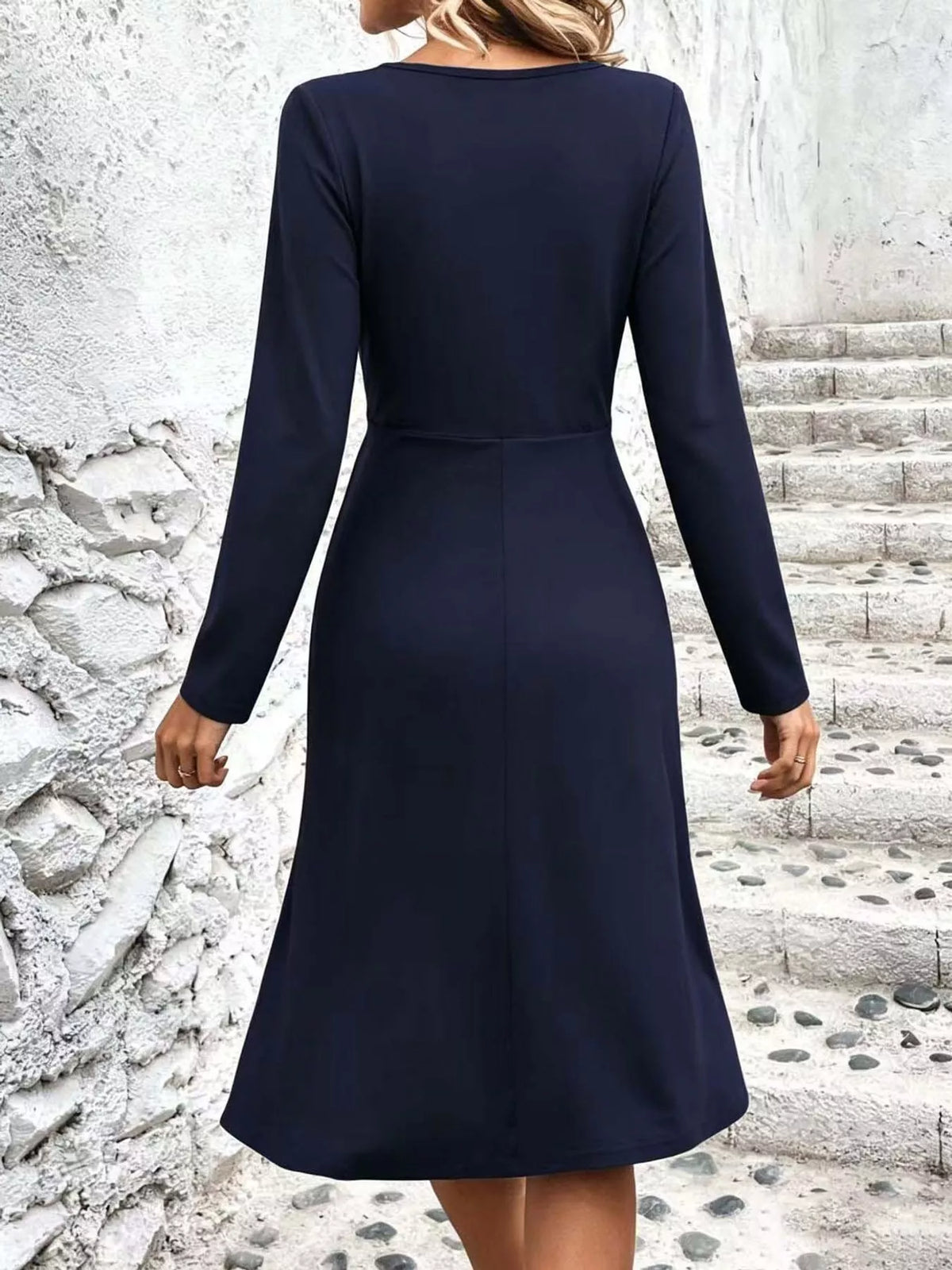 Navy long sleeve ruched-front midi dress, back view