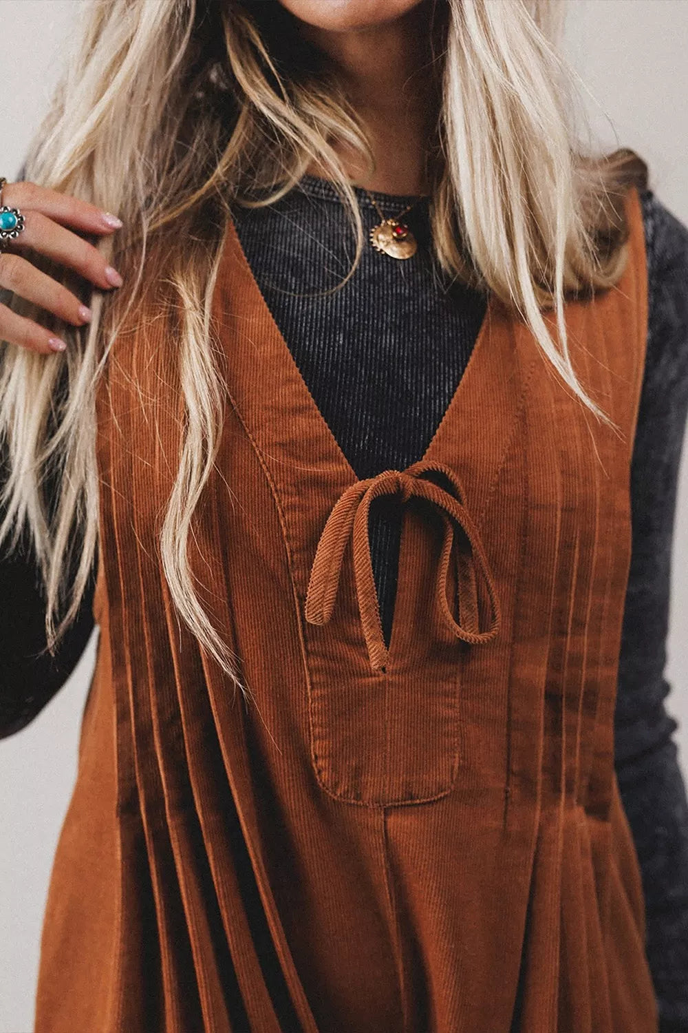 Rust brown corduroy romper, neckline detail