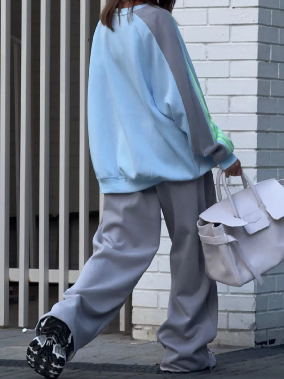 Blue top and gray pants color-block sweatshirt and wide-leg pants set — back view