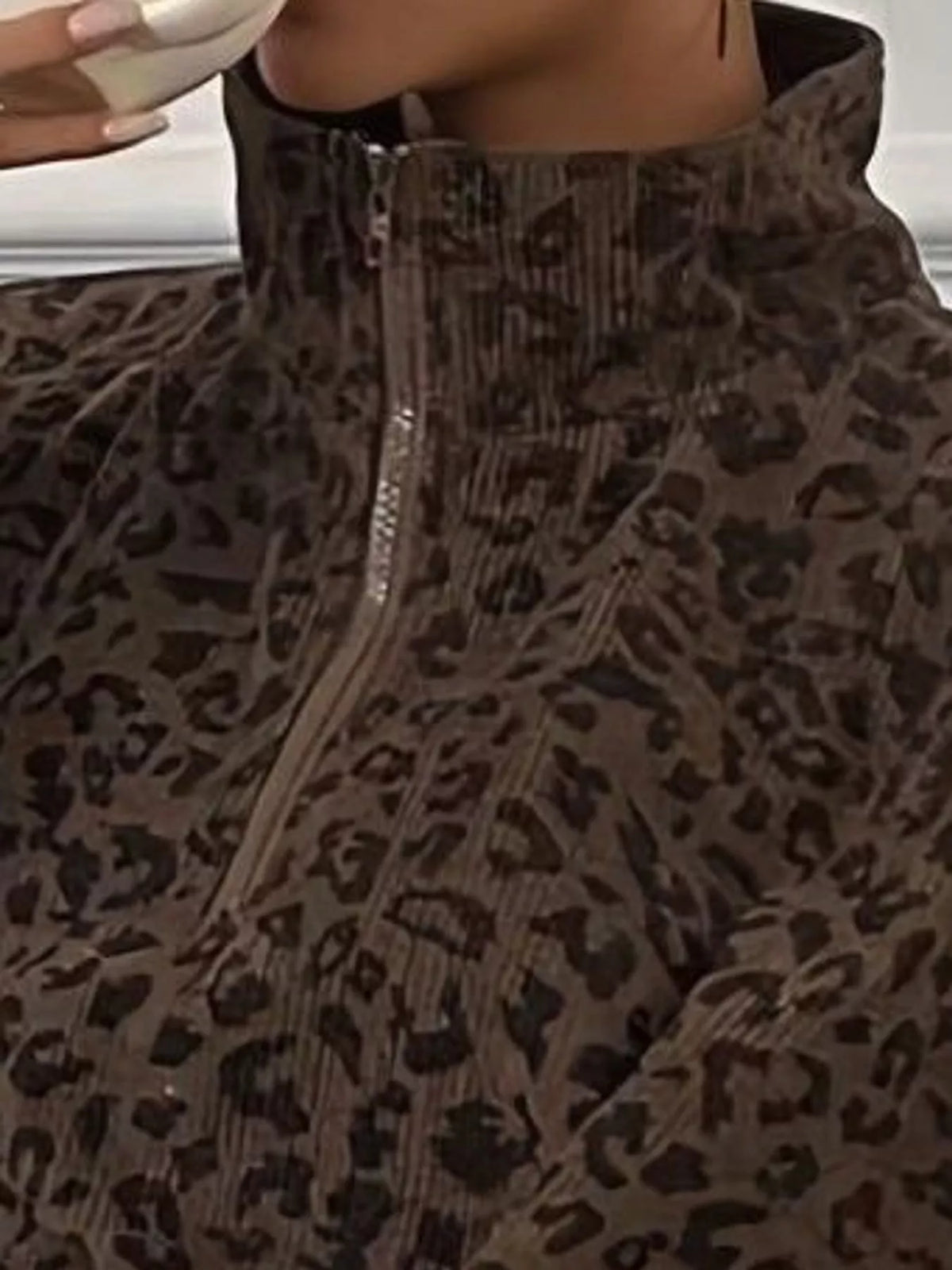 Coffee leopard print quarter-zip sweatshirt, detail view