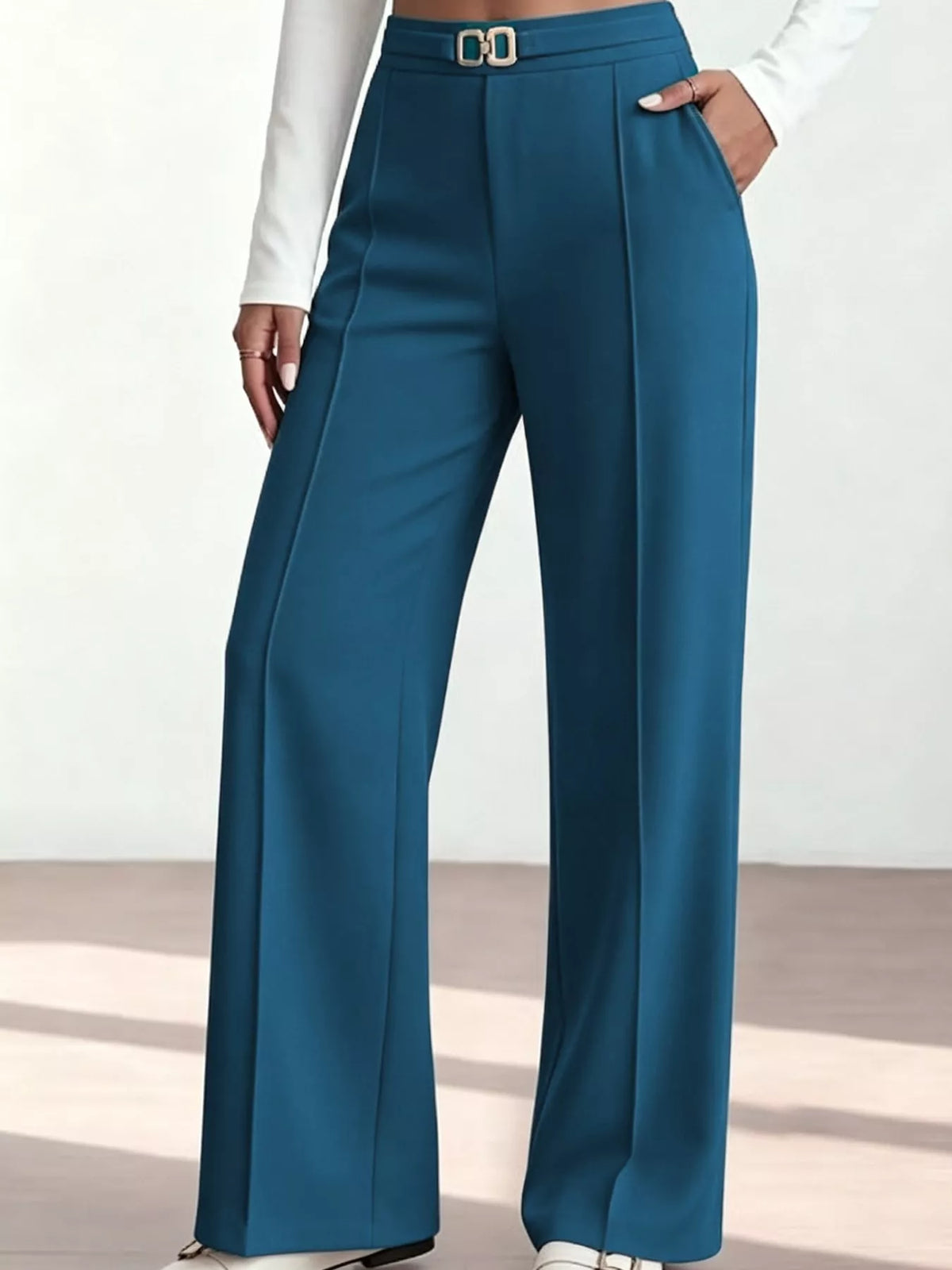 Wide-leg pants, teal pocket detail