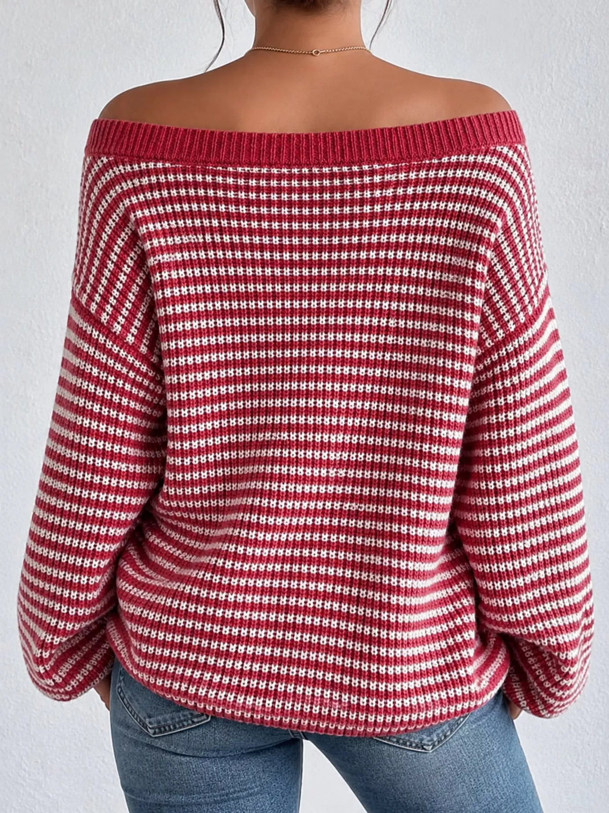 Red and white striped knit boat neck sweater