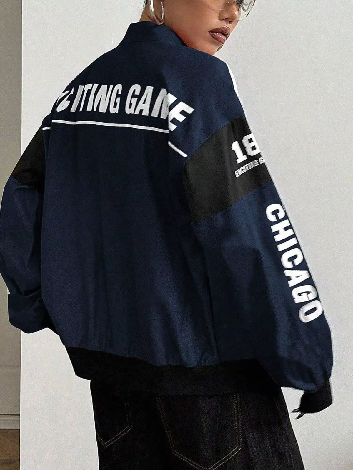 Navy and white letter-print zip-front jacket, back view
