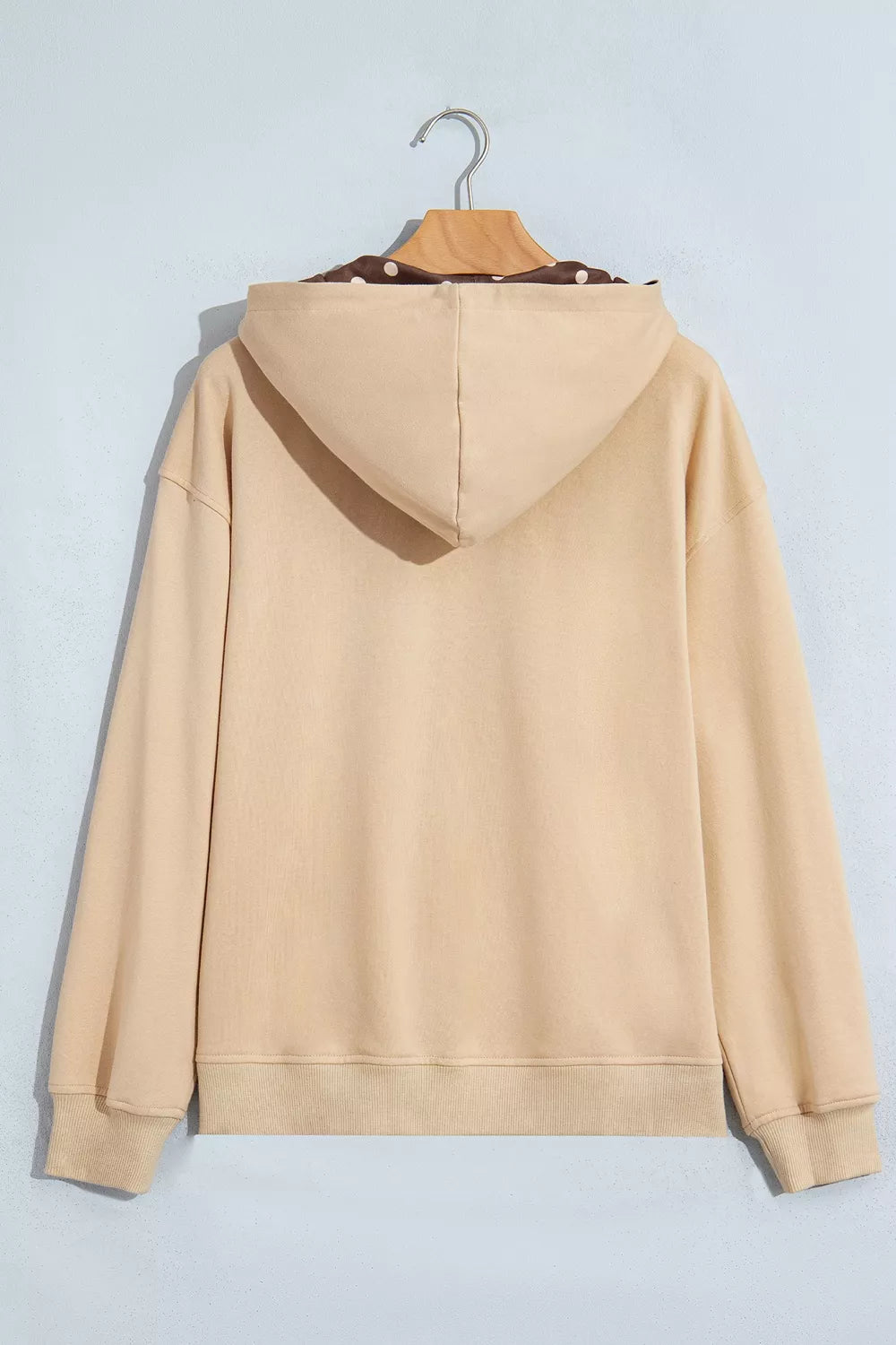 Polka Dot Zip-Up Hoodie in beige, hanger back view