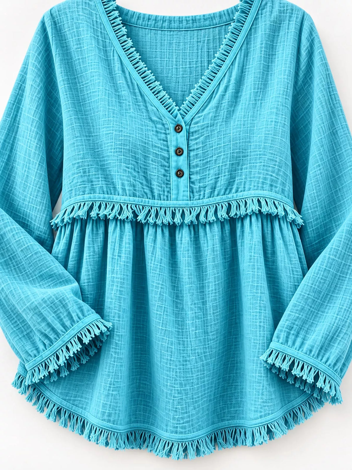 Fringe-trim blouse, turquoise neckline and hem detail