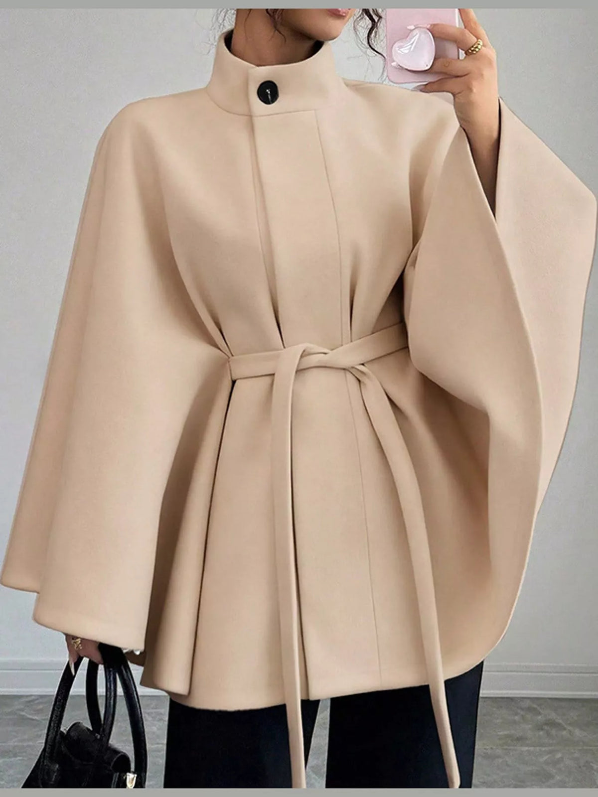 Beige tie-waist cape — front view