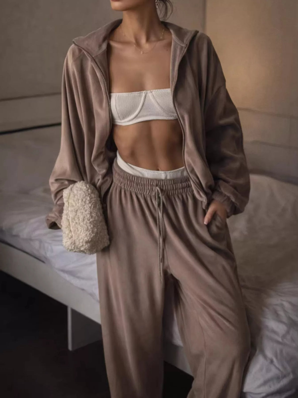 Brown zip-up outerwear and pants set — front view