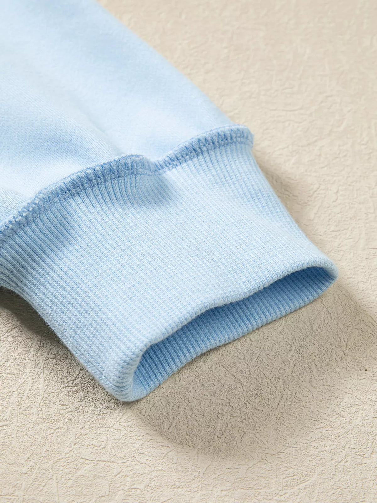 Ribbed cuff on light blue jesus saves stand neck oversized sweatshirt