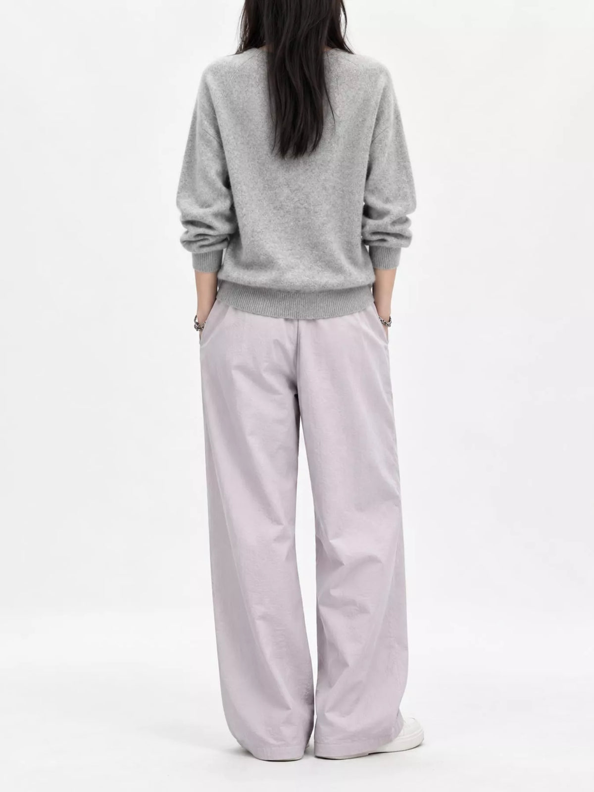 Light gray v-neck sweater, back view