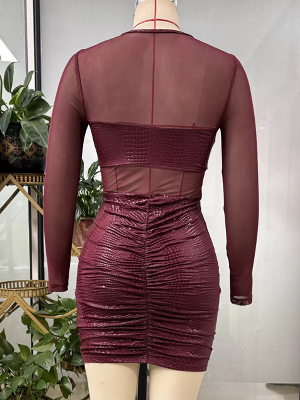 Round neck long sleeve mini dress, back view