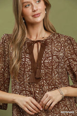 Trendsi Umgee Mix Geometric Print V-Neck Tassel Detail Tunic Dress -