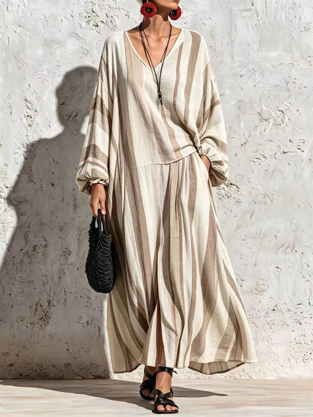 Cream and taupe striped v-neck top and wide-leg pants set, full front view.