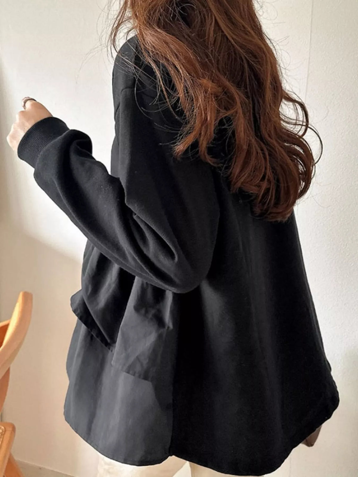 Color-block ruffled hem top, back view