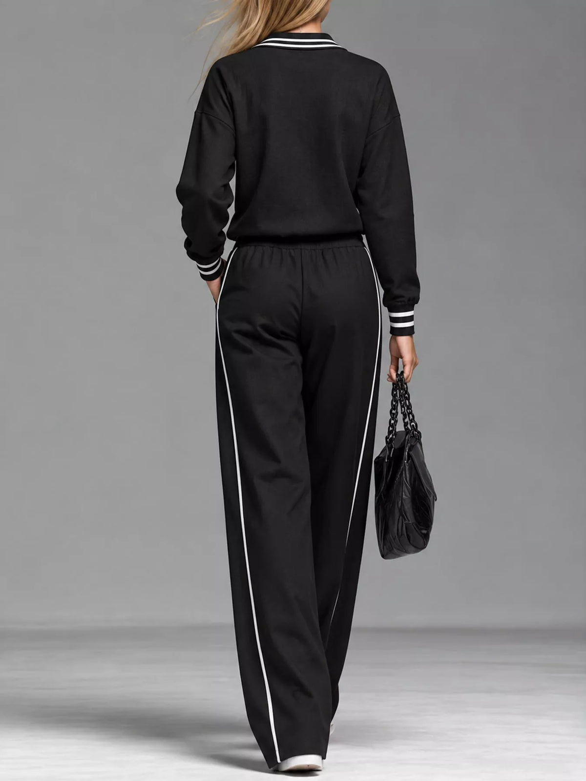 Black striped half zip top and pants set, back view