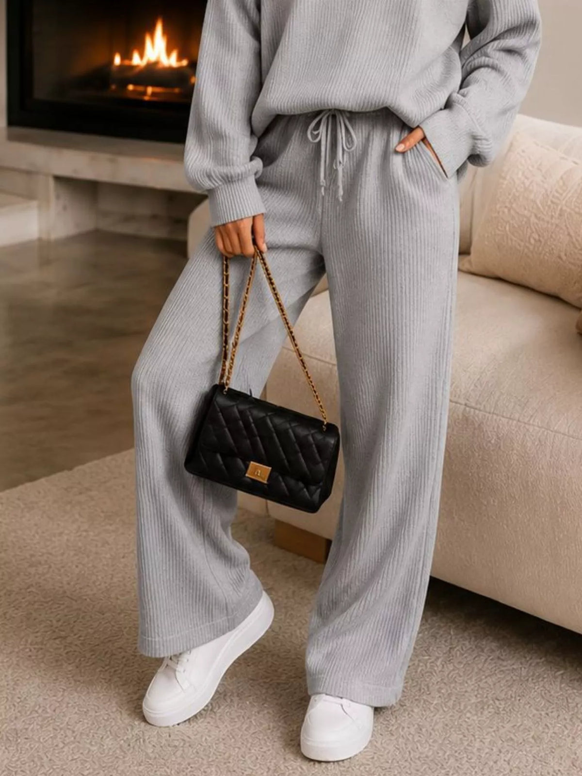 Gray quarter-zip knit top and pants set, pants detail