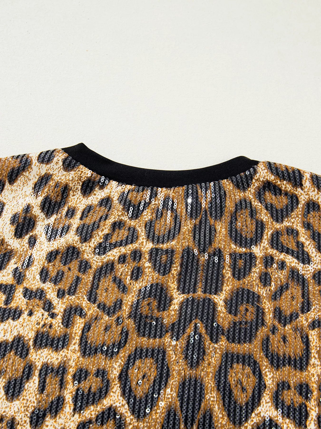 Trendsi Sequin Leopard Pattern Short Sleeve Top -