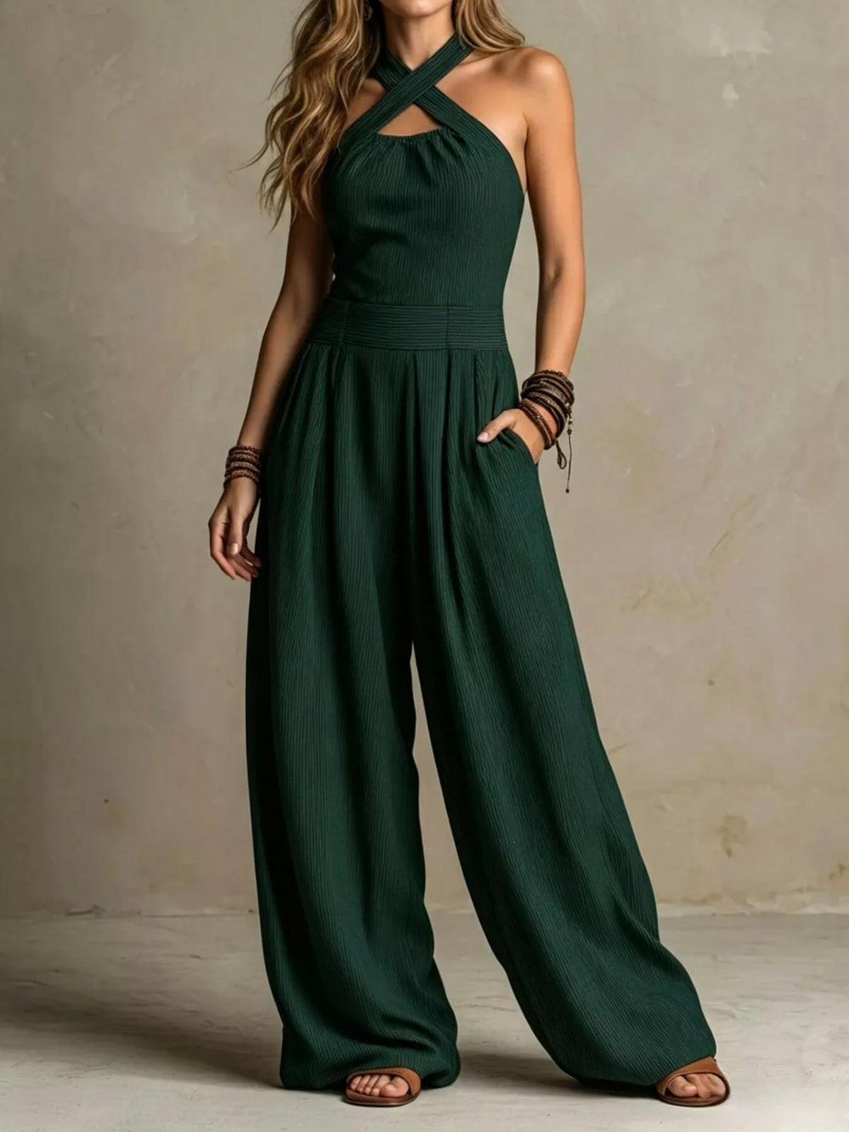 Green halter-neck wide-leg jumpsuit, front view