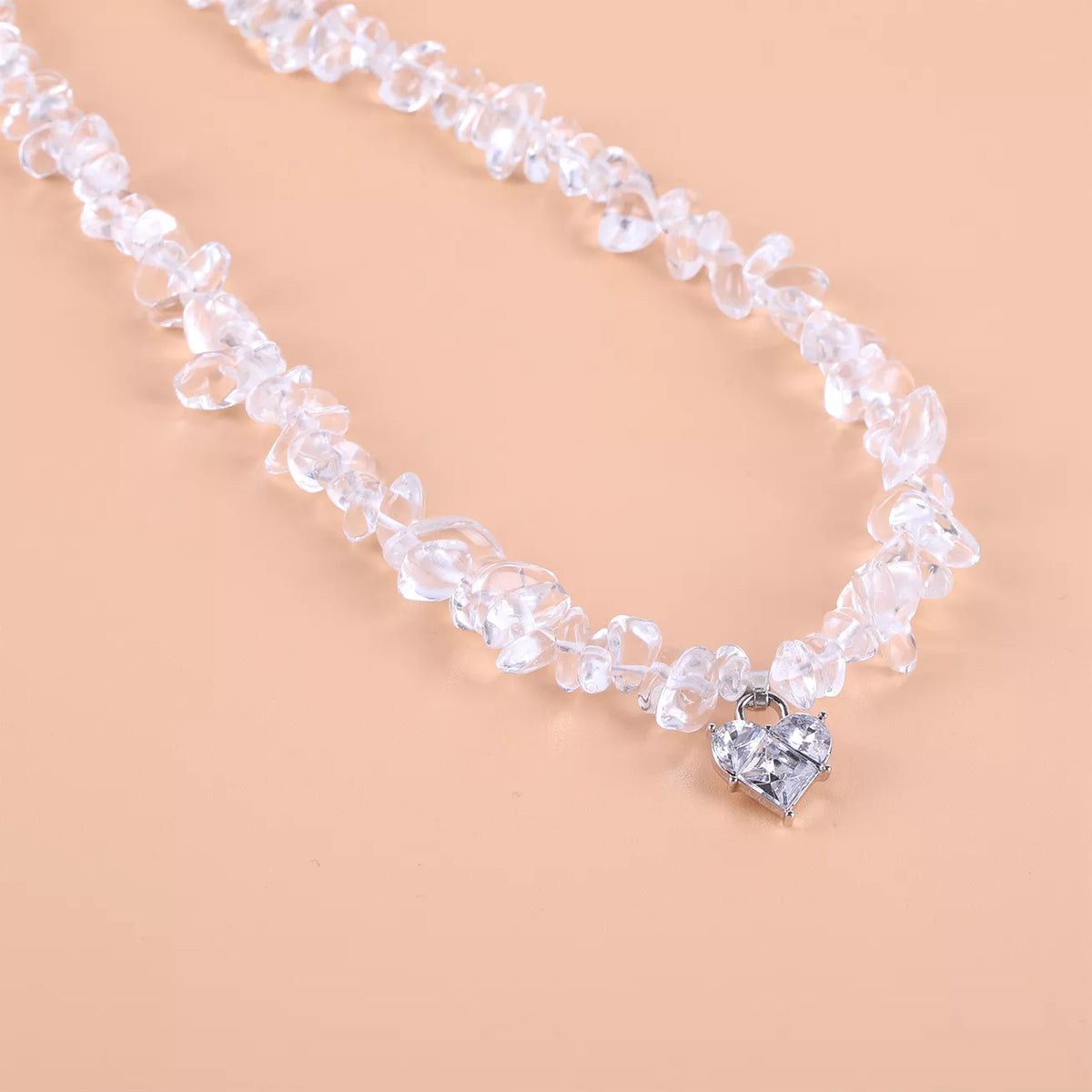 Silver crystal-chip heart pendant necklace, detail view