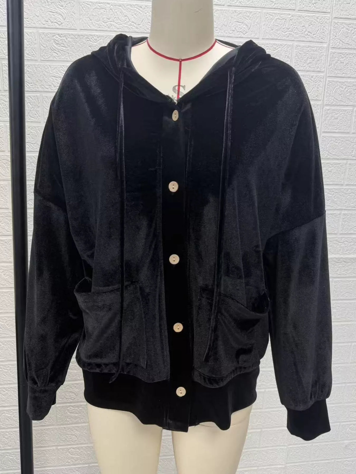 Black velvet dropped shoulder hoodie, front view