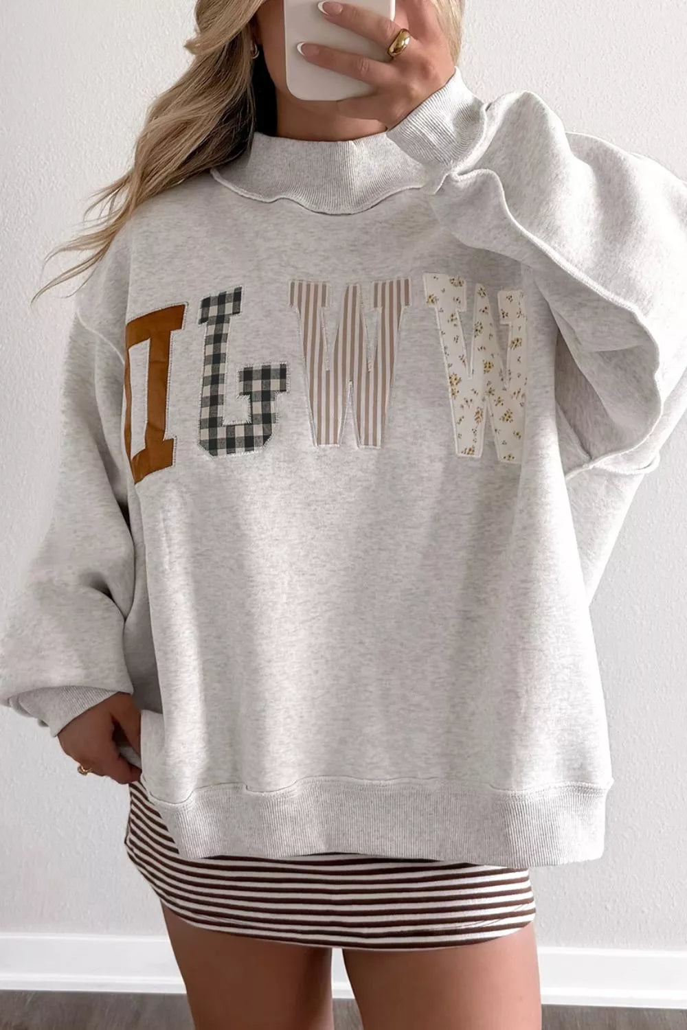 Trendsi WWJD Mix Pattern Letter Graphic Exposed Seam Loose Sweatshirt -
