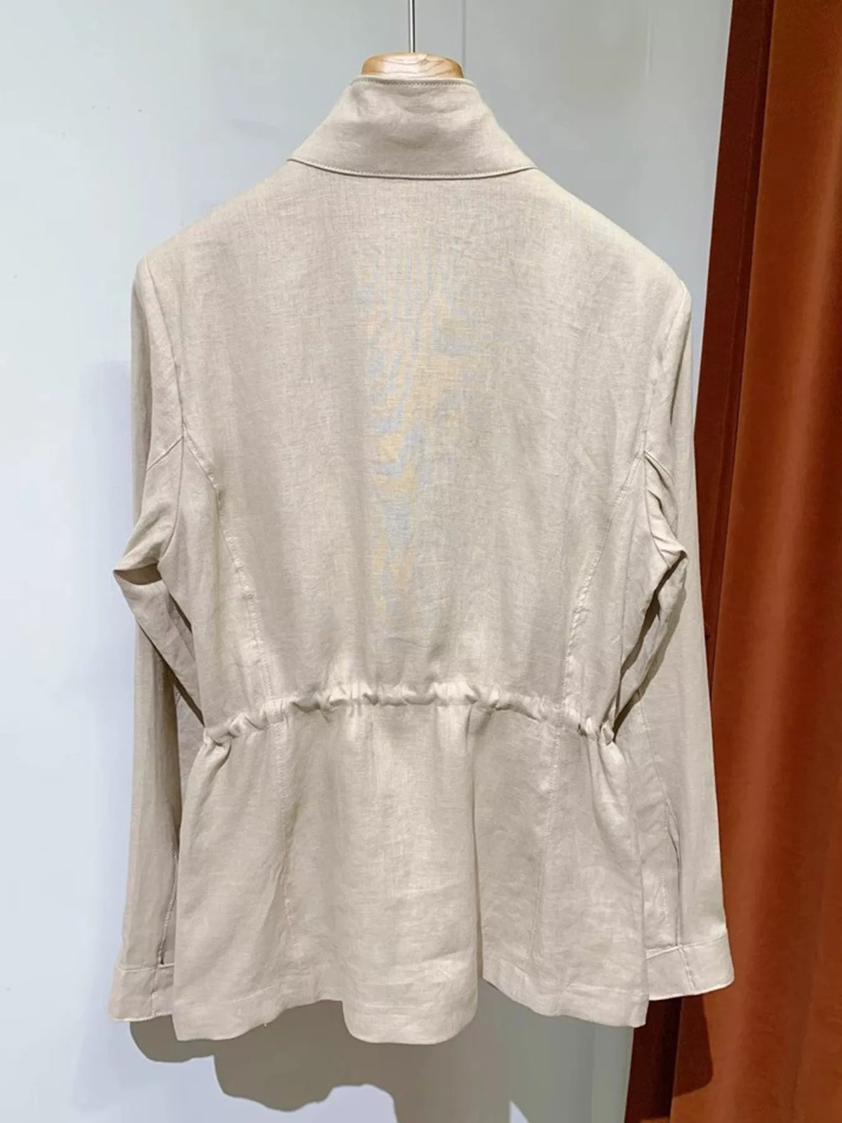 Beige lightweight multi pockets jacket — back view