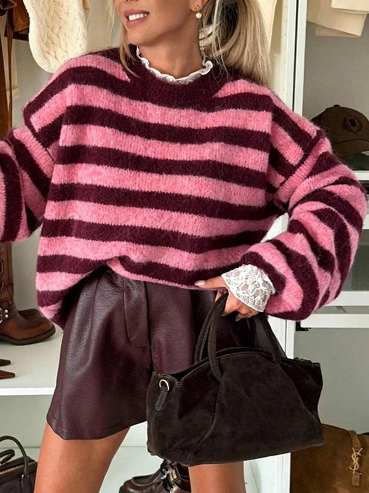 Pink and burgundy striped drop-shoulder sweater, front view with crew neck detail