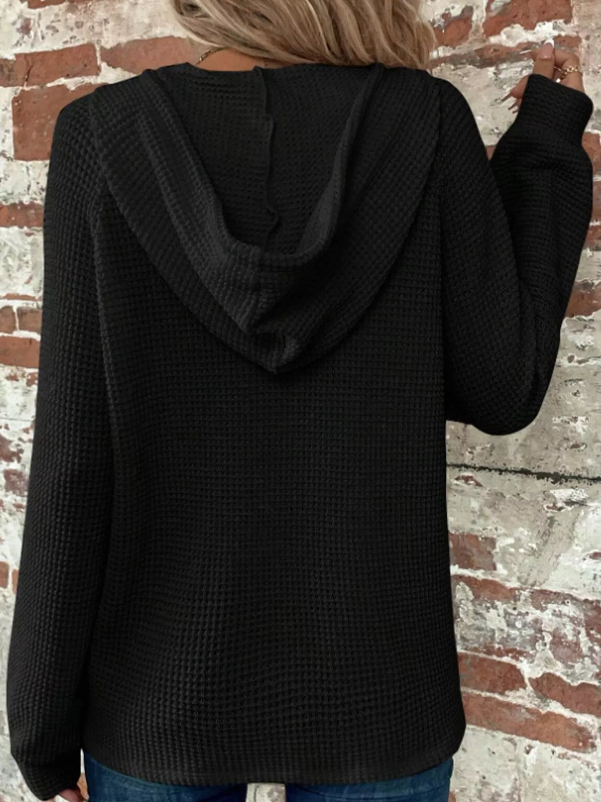 Black waffle knit button-detail hoodie, back view