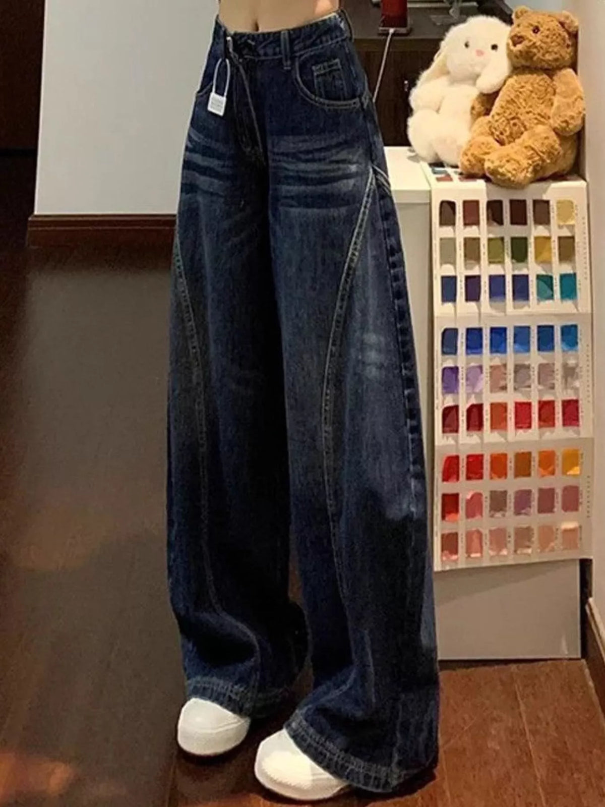 High-Waisted Wide-Leg Asymmetric Seam Vintage Wash Jeans — front view