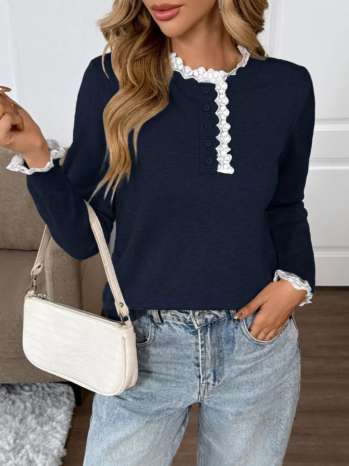 Navy lace-trim sweater with button-detail neckline
