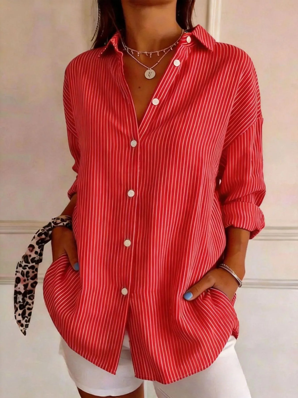 Red striped long sleeve shirt, button-front and rolled sleeves