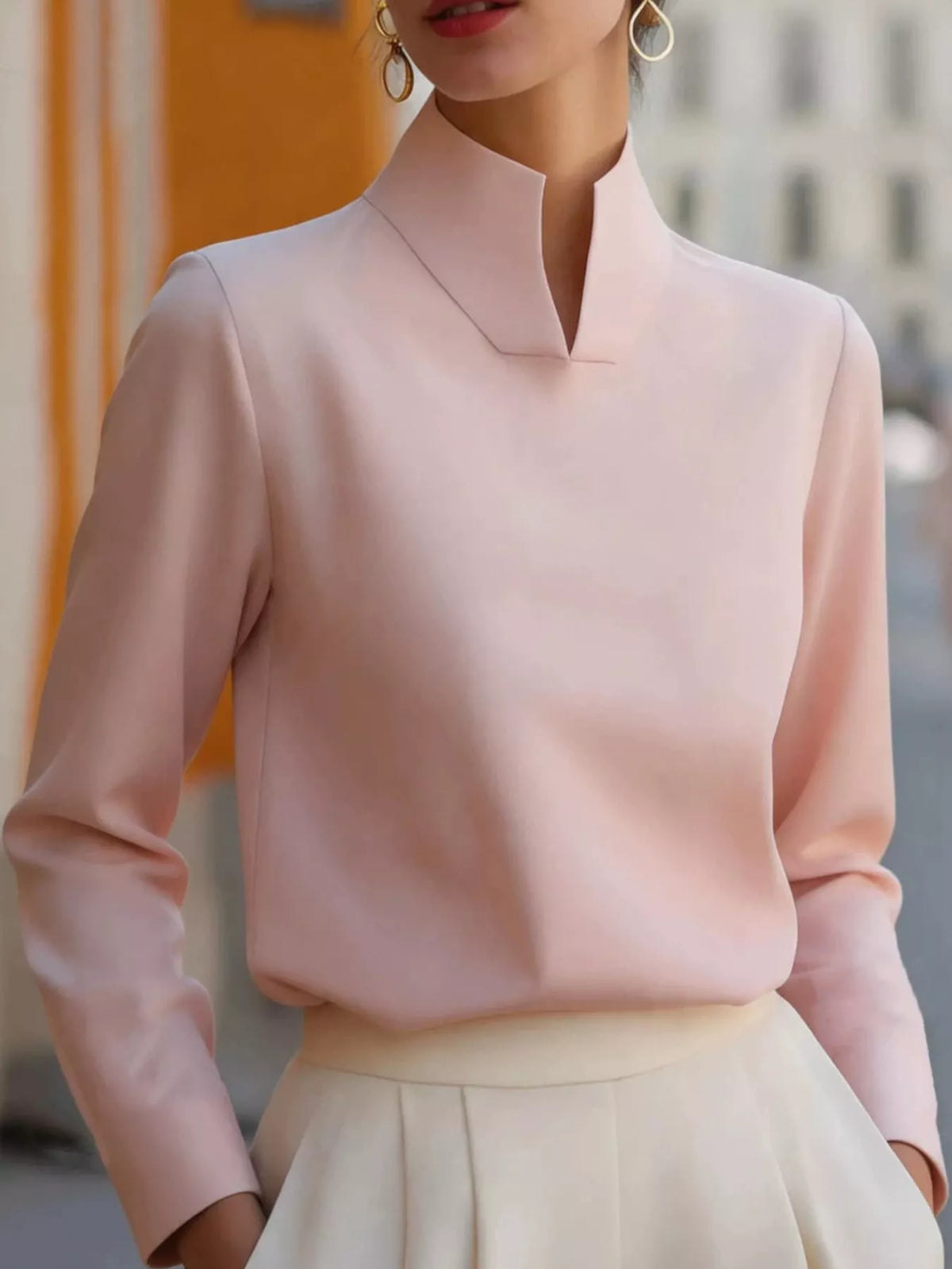 Mandarin neck long sleeve blouse, front view on model