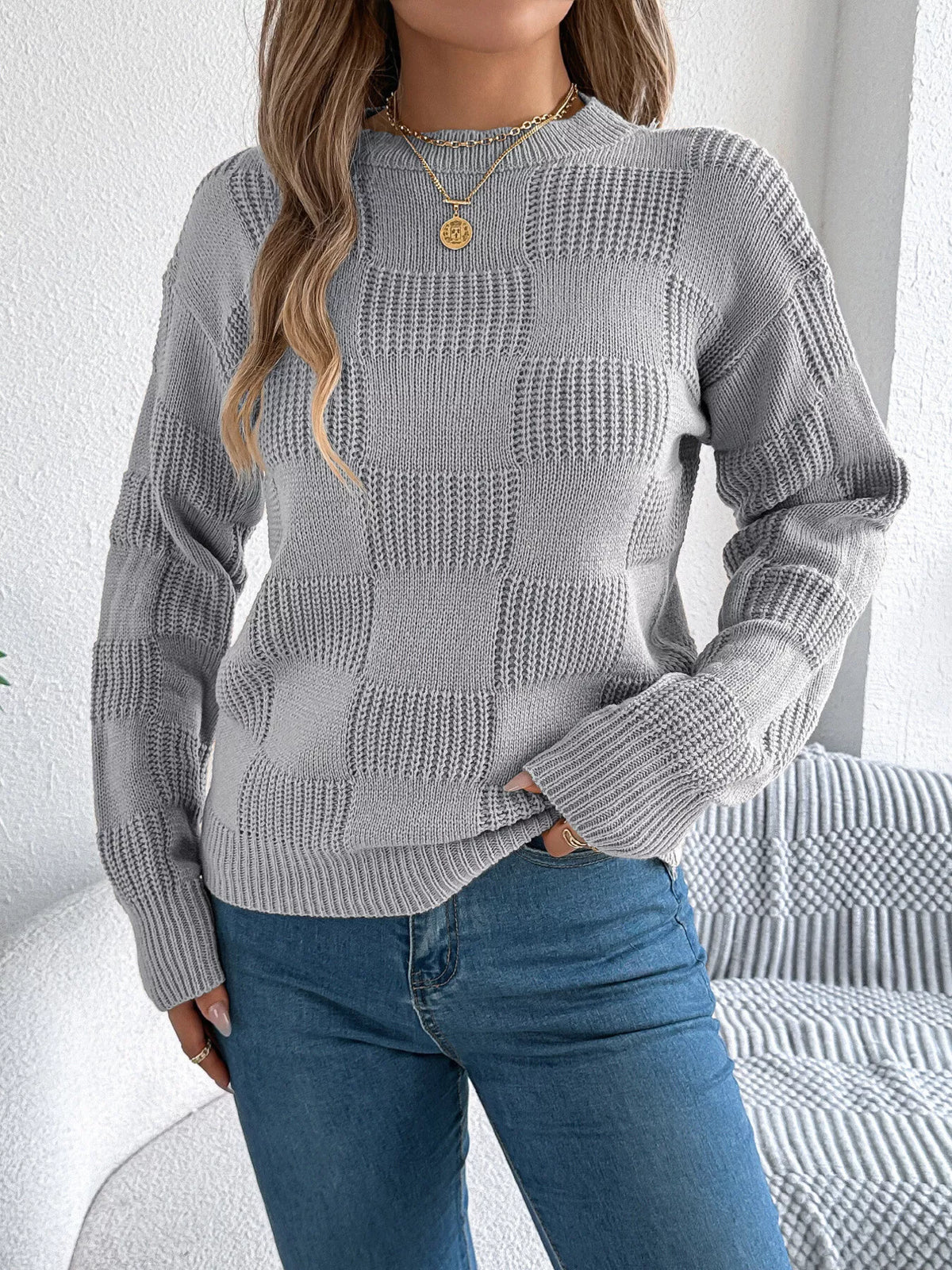Gray checkerboard textured knit sweater