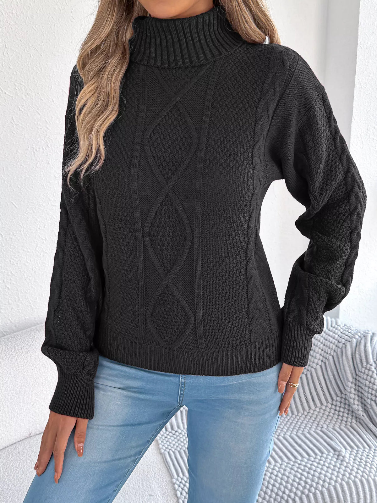 Black turtleneck cable knit sweater