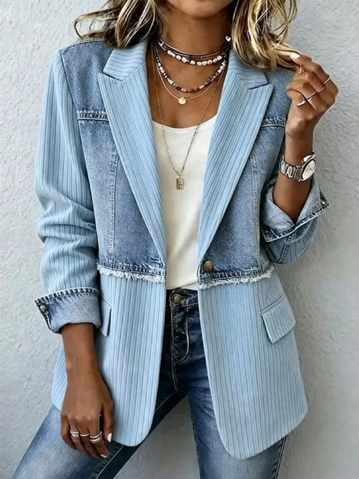 Blue ribbed blazer with contrasting panels, front view