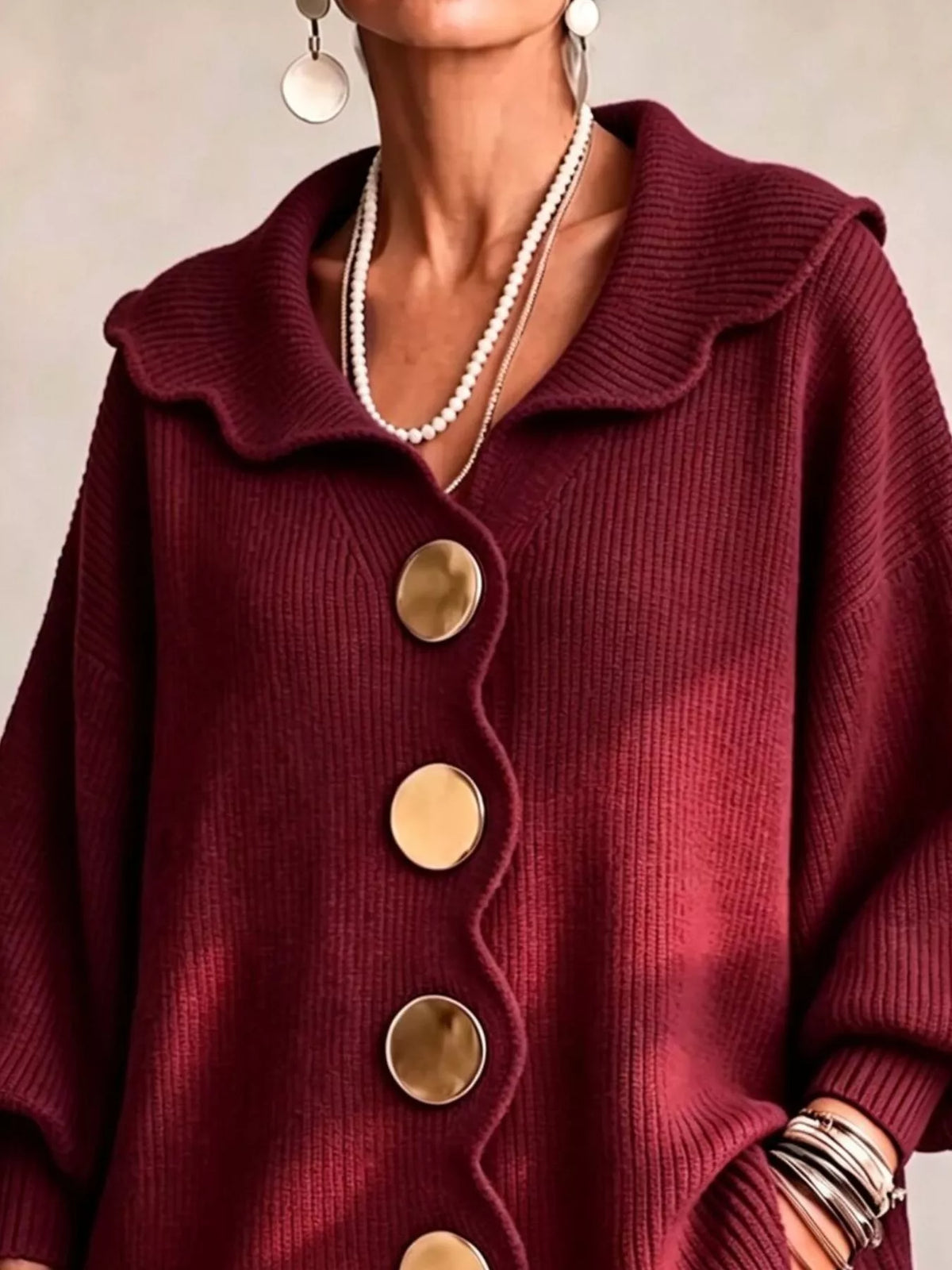 Burgundy scalloped-edge knit cardigan, collar detail