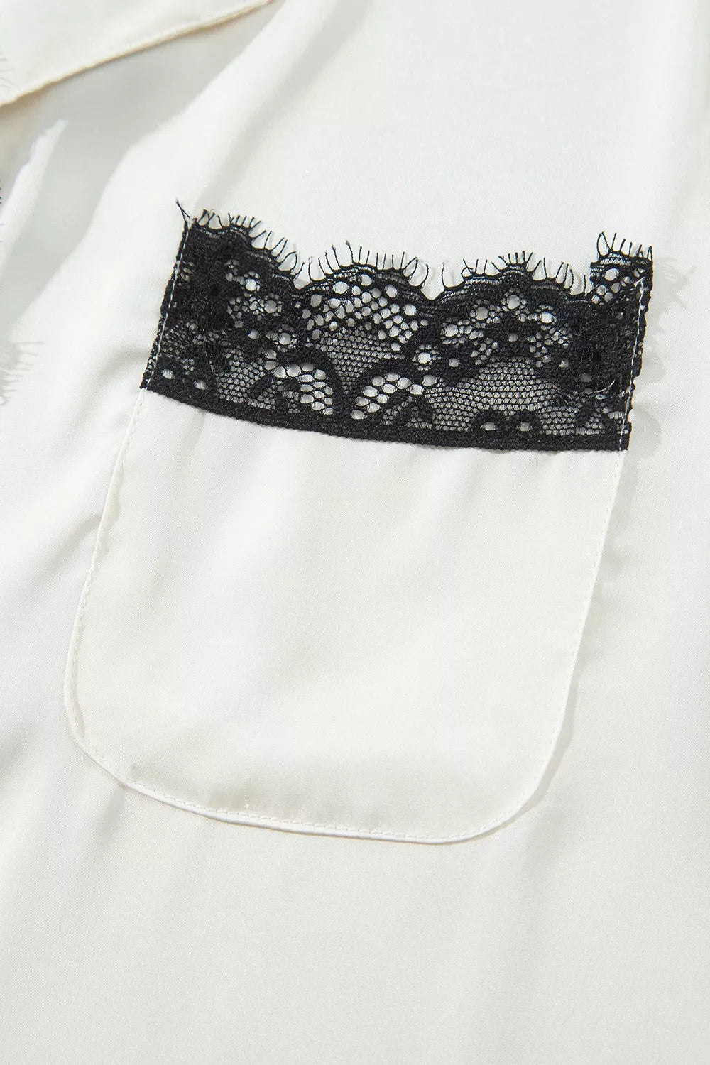 Ivory lace-trim button-front pajama set, lace-trim chest pocket detail.