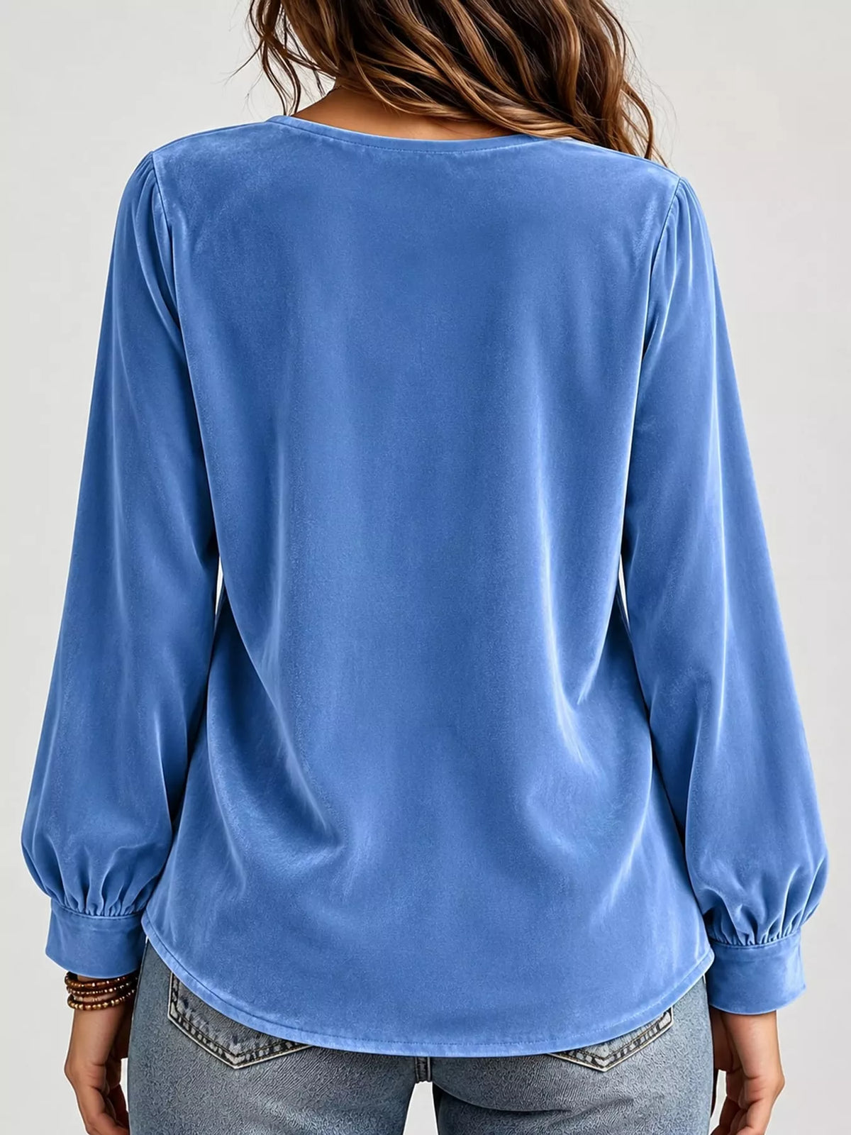 Blue front bow-tie V-neck top, back view