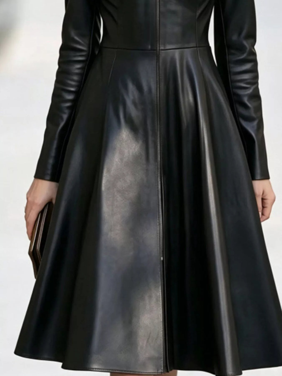 Black faux leather zip-front a-line midi dress, back view
